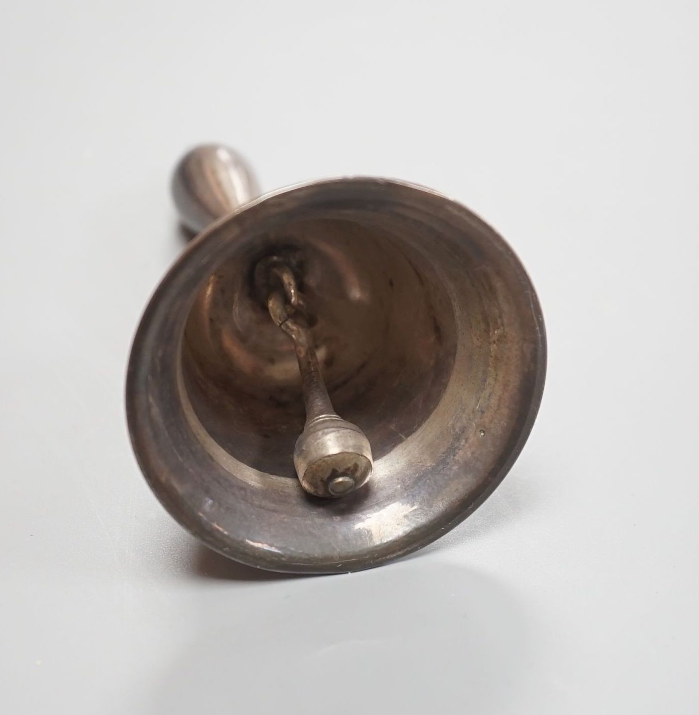 A George III silver hand bell, London, 1812, 11.5cm.